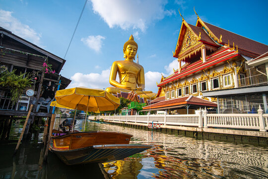 Giant big golden buddha statue with river at Paknam Phasicharoen sightseeing photo walk travel