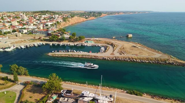 Aerial View of Nea Poteidaia Canal with Speedboat, Chalkidiki, Greece
