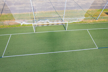 Fototapeta premium Empty football pitch with white goal post The Concept of Athletic Infrastructure
