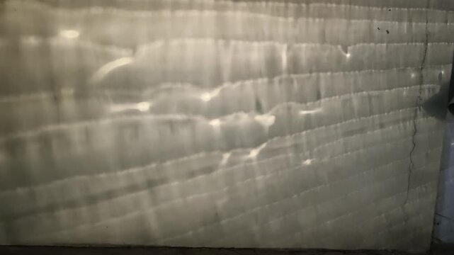 The light reflecting from the stainless steel