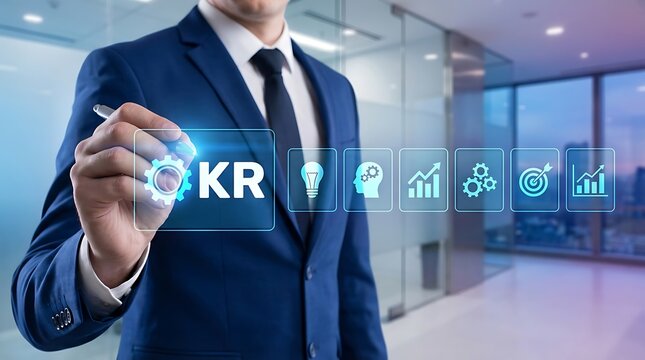 Close-up of businessman interacting with key results (kr) digital interface