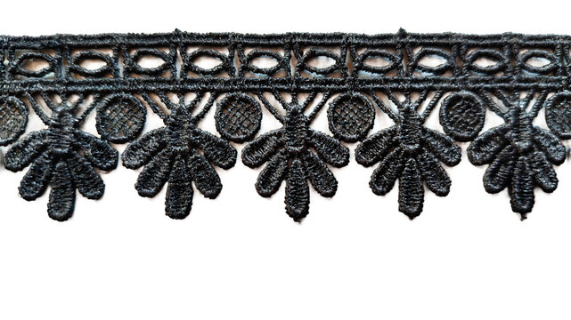 isolated An intricate piece of ornate lace trim with floral patterns and geometric shapes on a transparent background
