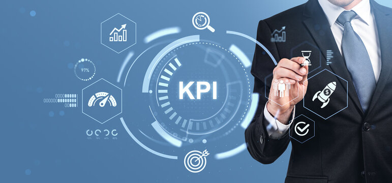 Business professional interacting with digital KPI interface fea