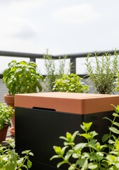 Fototapeta premium A modern, high-design urban composting bin on a balcony surrounded by lush herbs and city sunlight.