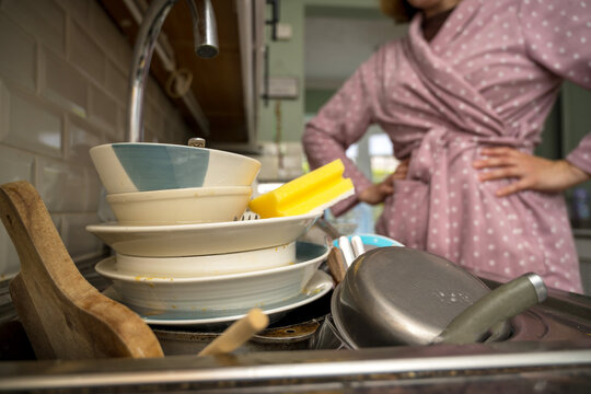 Dirty dishes in kitchen, clean space - clean mind