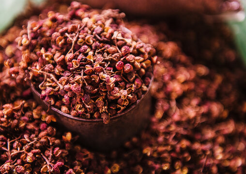 Sichuan pepper, a popular spice derived from the dried fruit husks of prickly ash trees for sale at the farmers market 