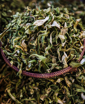 Dried lemon verbena leaves (Aloysia citrodora), which are used for making a fragrant herbal tea for sale at the farmers market 