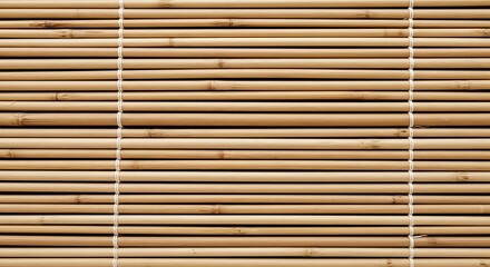 Obraz premium Close-up of a woven bamboo blind, showcasing the texture and pattern of natural materials