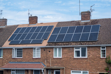 Solar panels on a house roof. Modern house and solar energy.