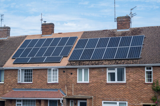 Solar panels on a house roof. Modern house and solar energy.