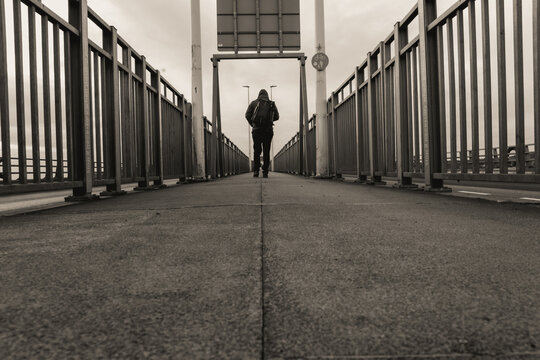  Lonly alone street walking guy tay bridge black and white moody