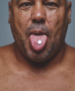 Grizzled Man with a Tongue-Out Expression