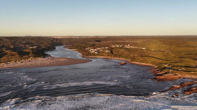 In river mouth delta of Arthur river on West Coast of Tasmania Edge of the World aerial view.