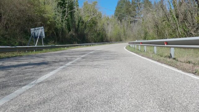 POV driving on a narrow countryside road near Rocchetta a Volturno, Italy