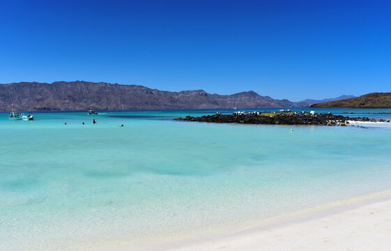 Bahia de Loreto National Park, Mexico stock photo images. Beautiful beach with white sand and turquoise water photo. Isla Coronados Baja California Sur. Crystal clear turquoise water with sandy beach
