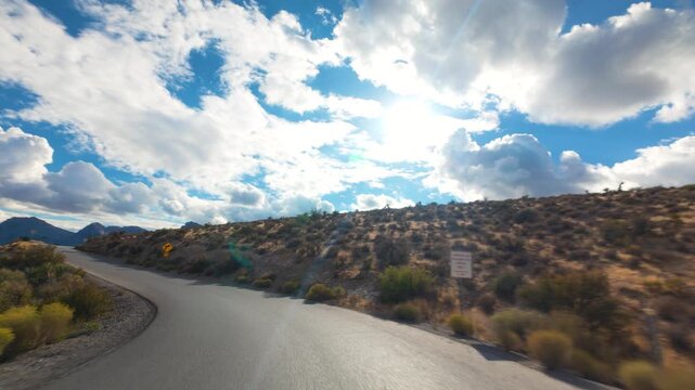 Red Rock Canyon Scenic Drive Loop POV 4K Sunny Day Dramatic Clouds Nevada