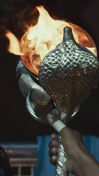 Varanasi, India. Man Makes Movements With Cup Smoking Incense On Ganga Maha Aarti Ceremony Begin...
