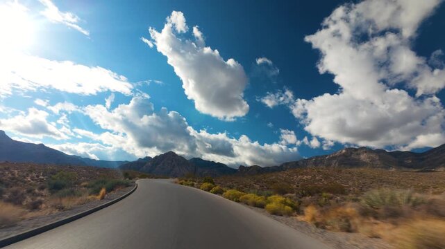 Red Rock Canyon Scenic Drive Loop POV 4K Sunny Day Dramatic Clouds Nevada