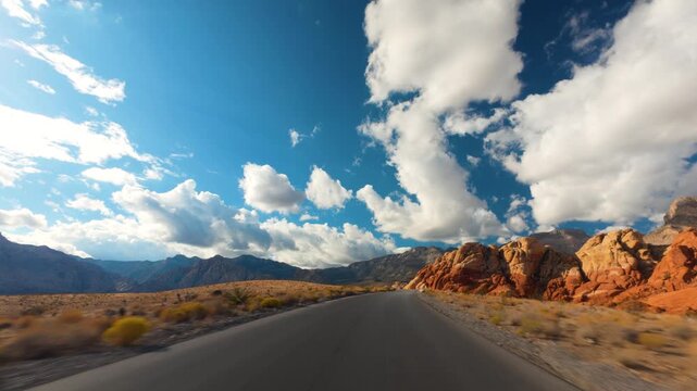 Red Rock Canyon Scenic Drive Loop POV 4K Sunny Day Dramatic Clouds Nevada