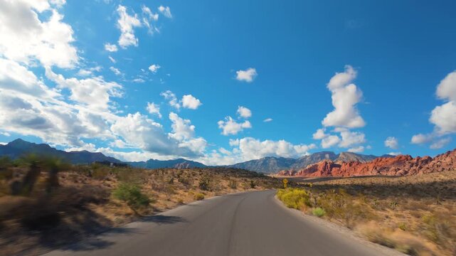 Red Rock Canyon Scenic Drive Loop POV 4K Sunny Day Dramatic Clouds Nevada