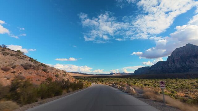 Red Rock Canyon Scenic Drive Loop POV 4K Sunny Day Dramatic Clouds Nevada