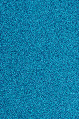 Fototapeta premium Sparkling blue glitter background texture close up