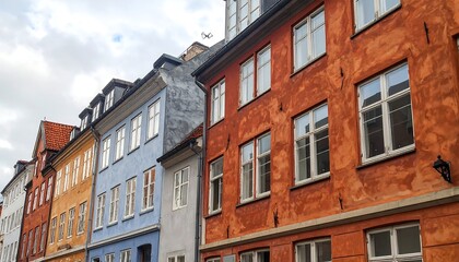 Fototapeta premium Colorful Buildings in Copenhagen - A Charming Street View.
