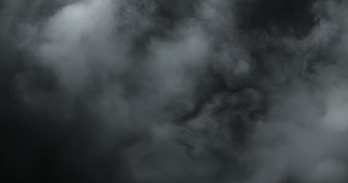 Smoke on black background. Premium cinematic fog and smoke VFX element featuring smooth, continuous motion and carefully balanced density that creates a believable and engaging atmospheric effect.