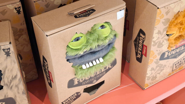 Fuggler funny ugly monster plush toy in cardboard box packaging on April 4, 2026 in Bangkok, Thailand.