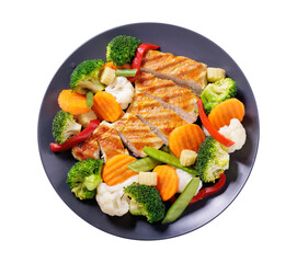 plate of grilled chicken and mix of steamed vegetables isolated on transparent background, top view