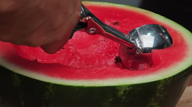 Watermelon fruit served with a scoop.