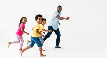 Obraz premium A happy black family with three kids running together on transparent background
