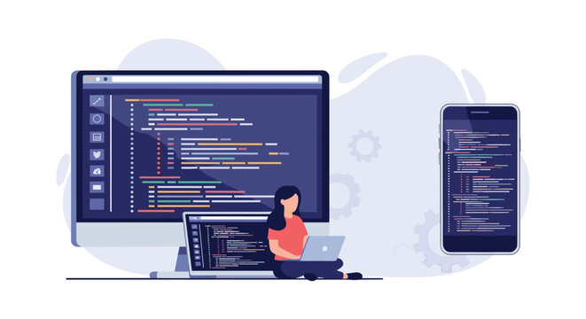Female software developer working on computer code while sitting on the floor with a laptop and a large monitor.