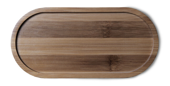 Oval wooden plate for snack on white background. Top view