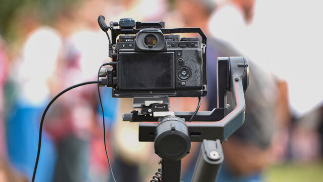 Professional video camera on gimbal rig filming live events at India Day festival, Moscow