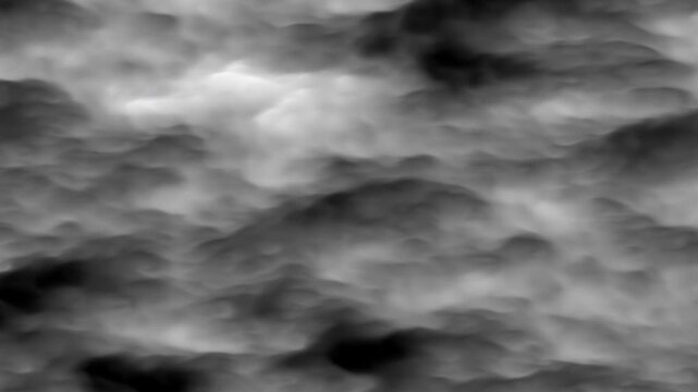 Abstract grayscale texture with cloudlike or smoky shapes suitable for backgrounds, overlays, design elements, and artistic projects. Texture is versatile.