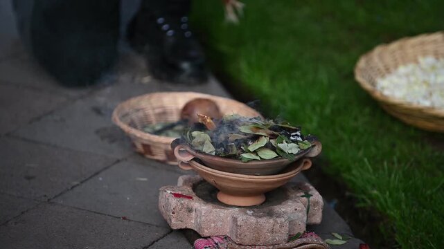 Burning coca leaves in a traditional Peruvian ritual