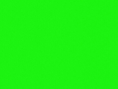 A solid green background with no additional elements or objects present