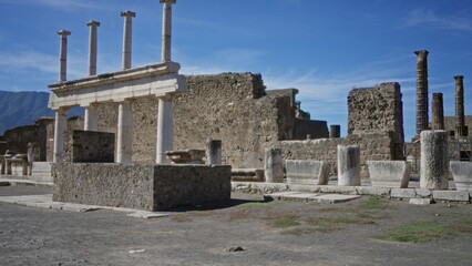 Ancient stone ruins and columns with weathered walls, soft defocused outdoor background  backplate copyspace calm. © Krakenimages.com