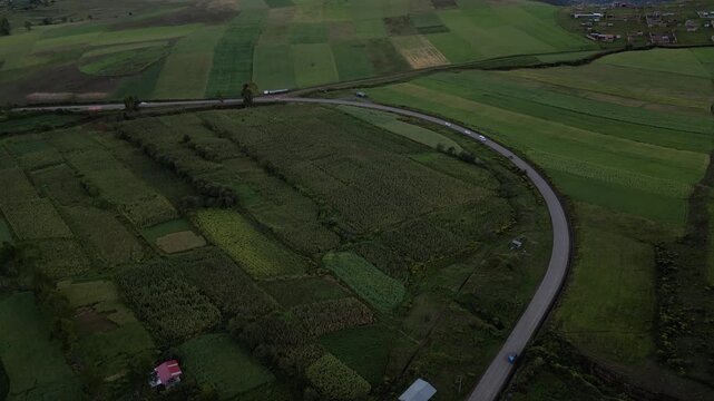 Aerial view of lush green farmland in a Peruvian valley