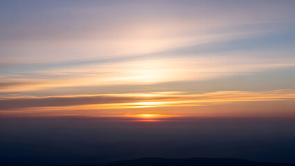 Fototapeta premium Spiritual sunset a breathtaking sky filled with golden light and peaceful energy