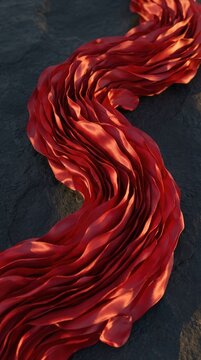 Flowing Red Fabric Waves Creating a Textured and Dynamic Abstract Pattern on a Dark Surface