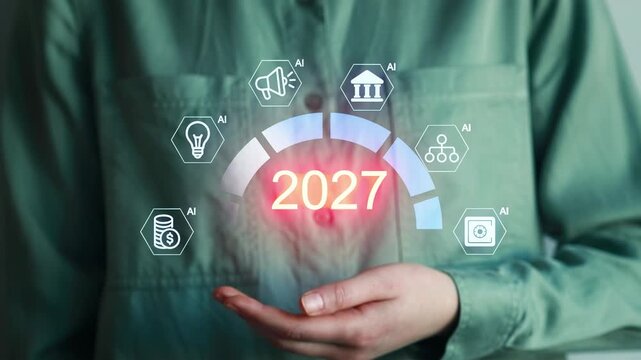 New trends in technology and AI focus for 2027 shown by a person holding a display with symbols and numbers.