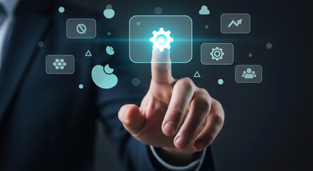 Fototapeta premium Digital automation concept with businessman touching gear icon, industrial process management interface, smart technology integration for business efficiency
