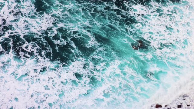 The Atlantic Ocean with rough waves off the coast of Madeira Island, Portugal.