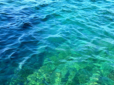 Mediterranean sea waves blue turquoise water.
