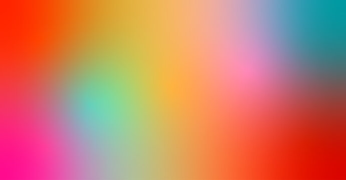 A vibrant, blurred gradient of colours blending from red to orange, yellow and blue