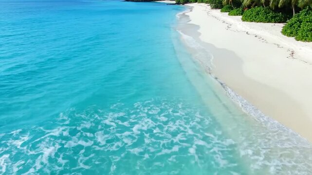 Aerial View of Turquoise Ocean Waves at Tropical Beach
