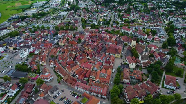 Aerial view around the city Haslach im Kinzigtal in Germany. On cloudy day in spring beside the Black forest