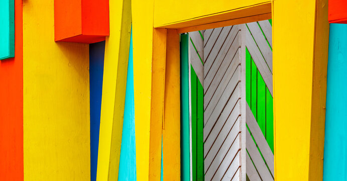 vibrant abstract shape made of painted wood, an idea for a creative background or splash screen.